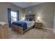 Guest bedroom with a queen-size bed and nightstands at 2518 Hayden Valley St, Apopka, FL 32703