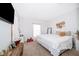 King size bed in bright bedroom with large window at 2873 Sunstone Dr, Kissimmee, FL 34758