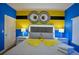Minion-themed bedroom with a large minion wall mural and king-size bed at 2952 Protagonist St, Kissimmee, FL 34746