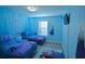 Frozen themed bedroom with twin beds and TV at 2952 Protagonist St, Kissimmee, FL 34746