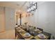 Modern dining room with elegant lighting fixture at 2952 Protagonist St, Kissimmee, FL 34746