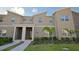 Modern two-story townhome with attractive landscaping at 2952 Protagonist St, Kissimmee, FL 34746