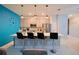 Modern kitchen with breakfast bar and stainless steel appliances at 2952 Protagonist St, Kissimmee, FL 34746