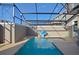 Private screened pool with a basketball hoop at 2952 Protagonist St, Kissimmee, FL 34746
