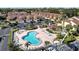 Community pool and surrounding condos from above at 3002 Clubview Dr, Orlando, FL 32822