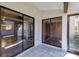 Enclosed patio with glass sliding doors and tile flooring at 3002 Clubview Dr, Orlando, FL 32822