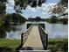 Wooden pier providing lake access at 3027 Eagle Lake Dr, Orlando, FL 32837