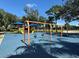 Community playground with swings at 3027 Eagle Lake Dr, Orlando, FL 32837