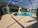 Inviting pool and spa with screened patio, perfect for outdoor entertaining at 3027 Eagle Lake Dr, Orlando, FL 32837