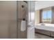 Bathroom with shower and access to a bedroom at 3224 Brasilia Ave # 3224, Kissimmee, FL 34747