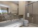 Bathroom with shower and granite countertop at 3224 Brasilia Ave # 3224, Kissimmee, FL 34747