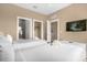 Twin bedroom with ensuite bathroom access, TV and ample closet space at 3224 Brasilia Ave # 3224, Kissimmee, FL 34747