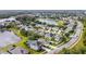 Aerial view of neighborhood and lake at 337 Fern Lake Dr, Orlando, FL 32825