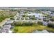 This aerial shows a desirable community near a serene pond, perfect for families seeking a tranquil and picturesque setting at 337 Fern Lake Dr, Orlando, FL 32825