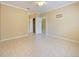 Large bedroom with tile floors and access to a closet at 337 Fern Lake Dr, Orlando, FL 32825