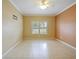 Spacious bedroom with tile floors and a ceiling fan at 337 Fern Lake Dr, Orlando, FL 32825