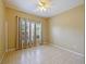 Bright bedroom with tile floors and neutral walls at 337 Fern Lake Dr, Orlando, FL 32825