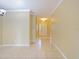 Bright hallway with tile floors leading to other rooms at 337 Fern Lake Dr, Orlando, FL 32825