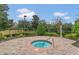 Relaxing community hot tub with surrounding landscaping at 337 Fern Lake Dr, Orlando, FL 32825