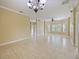 Spacious living room with tile floors and large windows at 337 Fern Lake Dr, Orlando, FL 32825