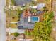 Overhead view of house, showcasing the backyard pool and solar panels at 3717 Jericho Dr, Casselberry, FL 32707