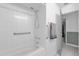 Bathroom with a bathtub, shower, and grab bars at 3717 Jericho Dr, Casselberry, FL 32707