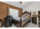 Bedroom with a large bed, nightstand, and ceiling fan at 3717 Jericho Dr, Casselberry, FL 32707