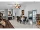 Charming dining area with tile floors and a view into the living room at 3717 Jericho Dr, Casselberry, FL 32707