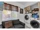 Laundry room with washer, dryer, and a small couch at 3717 Jericho Dr, Casselberry, FL 32707