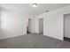 Bright bedroom with neutral carpet and an en-suite bathroom at 4537 Sidesaddle Trl, St Cloud, FL 34772