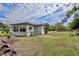 House exterior showcasing a simple design and a nice lawn at 544 Eartha Ln, Orlando, FL 32805