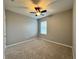 Spacious bedroom with neutral decor and carpeted floors at 617 Finn Ave, Auburndale, FL 33823