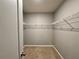 Spacious walk-in closet with wire shelving at 617 Finn Ave, Auburndale, FL 33823