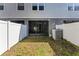 Small backyard with privacy fence and AC unit at 622 Glastonbury Dr, Orlando, FL 32825