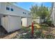 Small backyard with a fire hydrant and fence at 622 Glastonbury Dr, Orlando, FL 32825