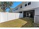 Small backyard with privacy fence and AC unit at 622 Glastonbury Dr, Orlando, FL 32825