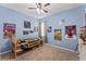 bedroom with carpet, ceiling fan, and window at 622 Glastonbury Dr, Orlando, FL 32825