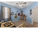 Bright bedroom featuring carpet, ceiling fan, and ample storage at 622 Glastonbury Dr, Orlando, FL 32825