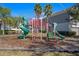 Community playground with slides and climbing structures at 622 Glastonbury Dr, Orlando, FL 32825