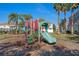 Community playground with slides and climbing structures at 622 Glastonbury Dr, Orlando, FL 32825