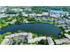 Aerial view of community with lake and surrounding area at 646 Jasmine Rd, Altamonte Springs, FL 32701