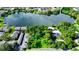 Aerial view showcasing lakefront property and surrounding area at 646 Jasmine Rd, Altamonte Springs, FL 32701