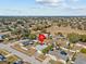 Aerial view showcasing a single-story house and its surroundings at 7852 Murcott Cir, Orlando, FL 32835