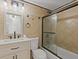 Updated bathroom with a large shower and modern vanity at 7852 Murcott Cir, Orlando, FL 32835