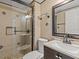 Clean bathroom with a shower/tub combo and modern vanity at 7852 Murcott Cir, Orlando, FL 32835