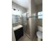 Clean bathroom with a shower/tub combo and updated vanity at 7852 Murcott Cir, Orlando, FL 32835