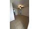 Large bedroom with tile flooring and access to bathroom at 7852 Murcott Cir, Orlando, FL 32835