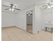 Laundry room with tile floor, sink, and access to another room at 7852 Murcott Cir, Orlando, FL 32835