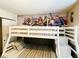 Bunk beds in a bedroom with a superhero mural at 8902 Sydney Ave, Kissimmee, FL 34747