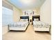 Two twin beds in a beach-themed guest bedroom at 8902 Sydney Ave, Kissimmee, FL 34747